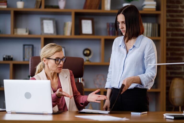 Employee reviewing termination letter after being fired for a false reason in California