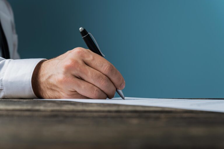 Employee signing a severance agreement
